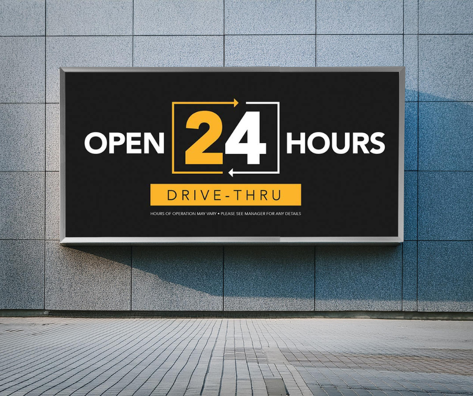 black and yellow drive thru open 24 hours mini billboard on wall