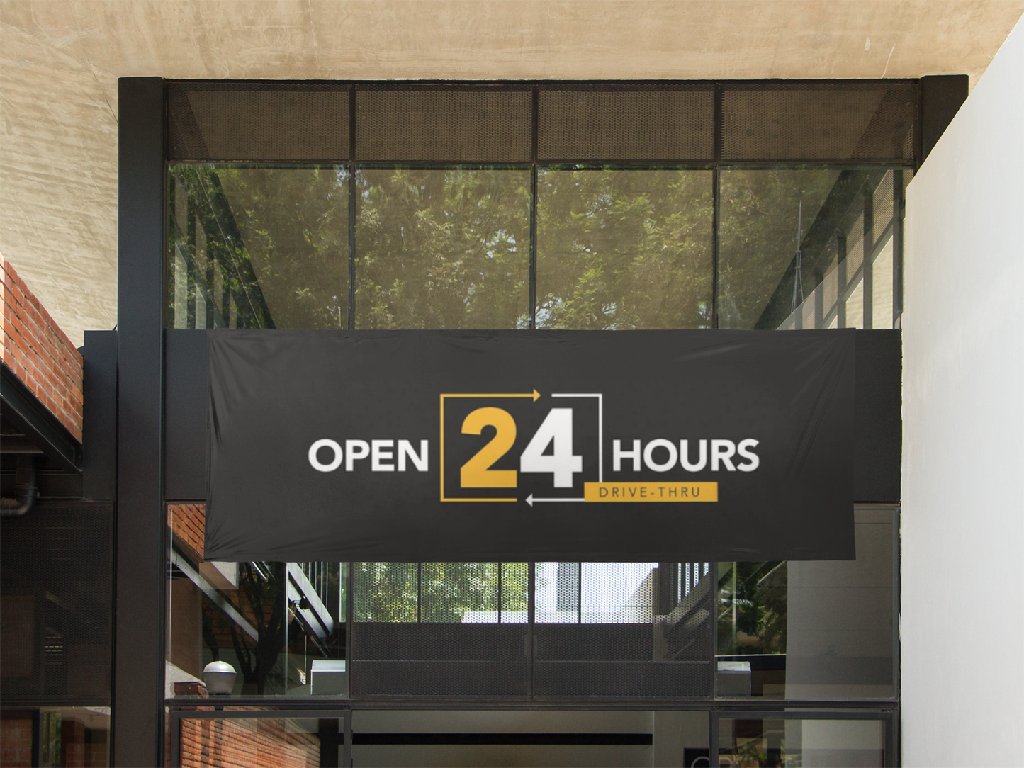 black, yellow, white, 24-hour drive thru banner on building entrance