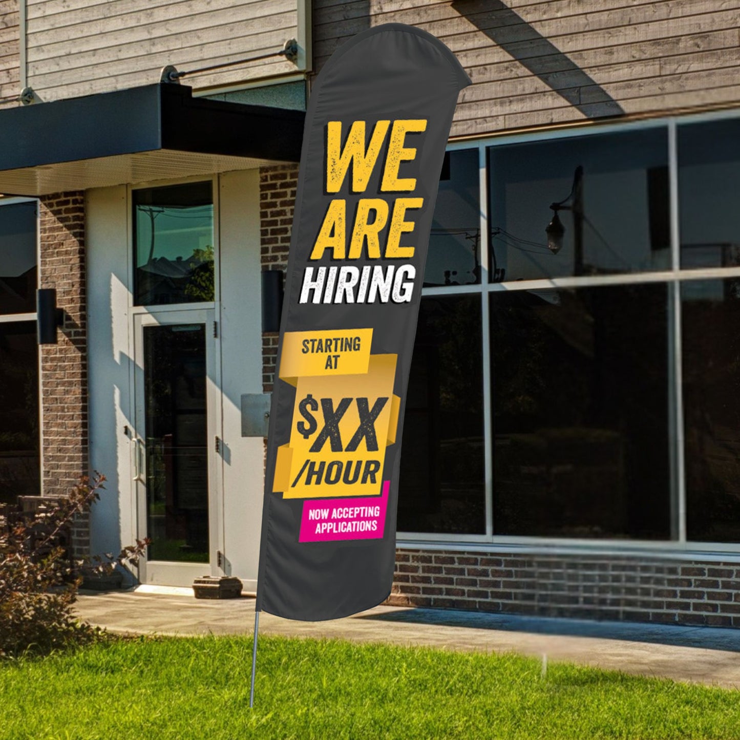 custom gray yellow and pink we are hiring blade flag in front of building