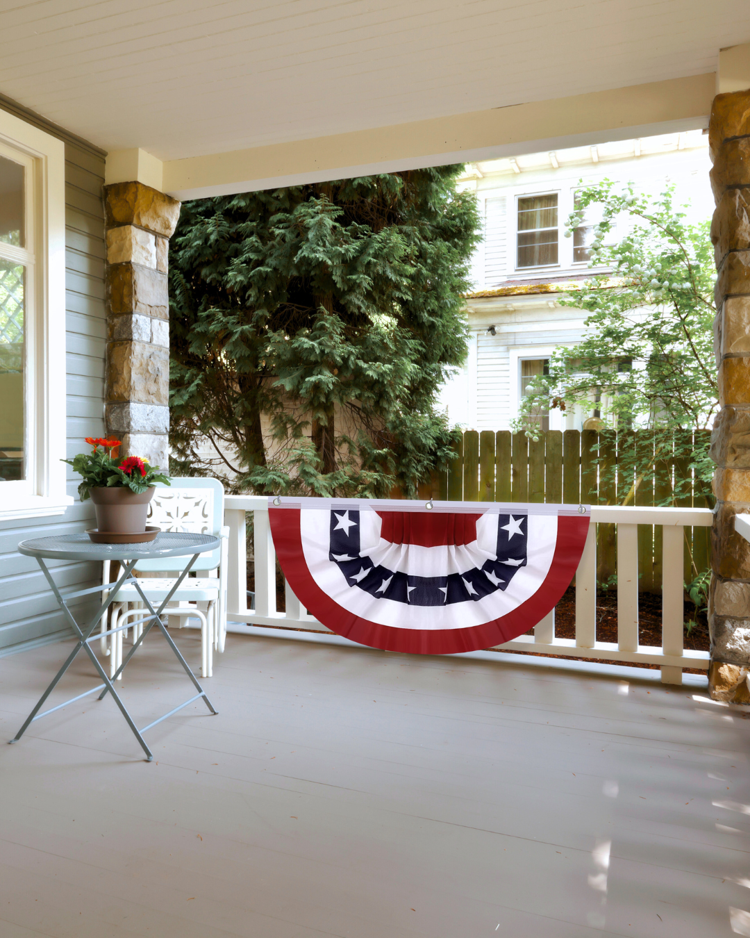 red white and blue bunting on front porch