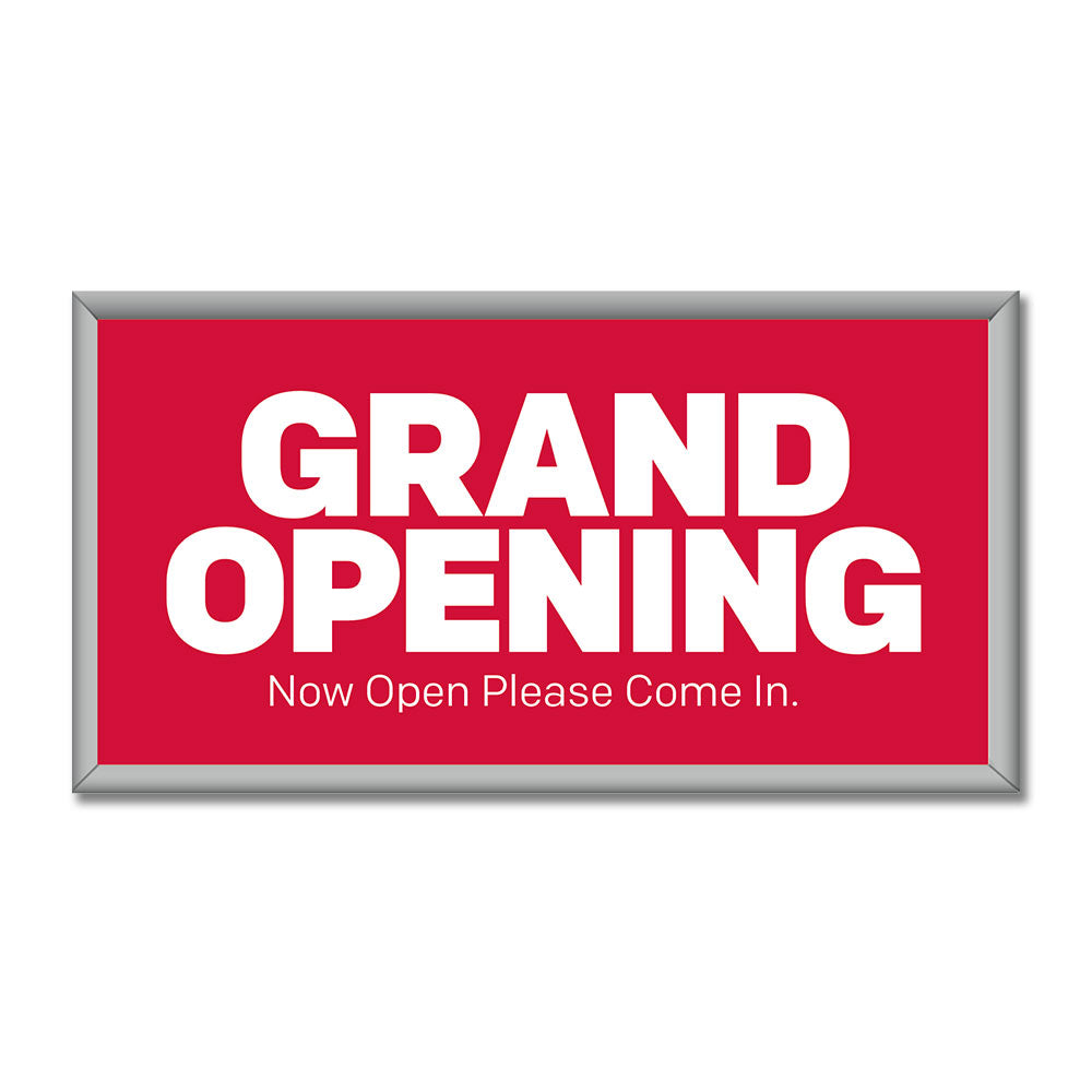 Red rectangular sign with white text that reads 'GRAND OPENING NOW PLEASE COME IN'