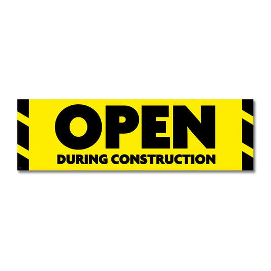 A yellow banner with black text and stripes, indicating 'OPEN DURING CONSTRUCTION'.