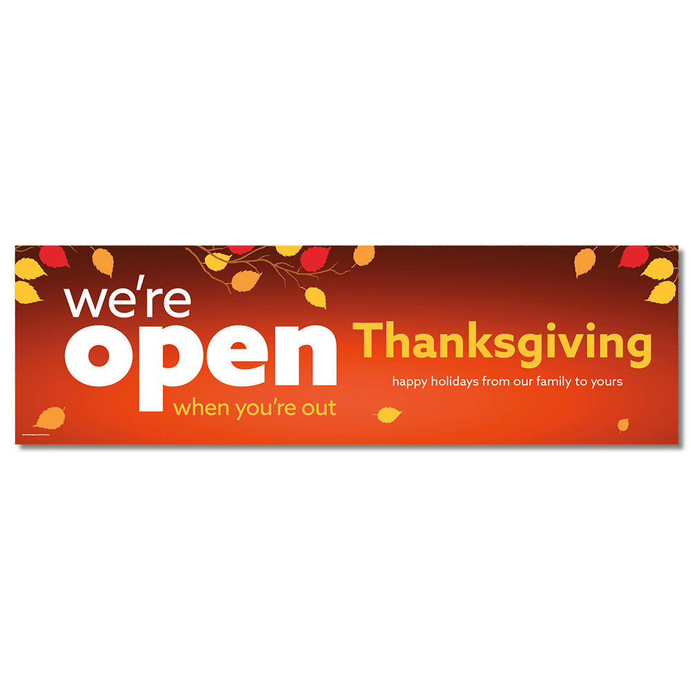 A banner with a red background featuring text that reads 'we're open Thanksgiving' surrounded by fall leaves in shades of orange and yellow.