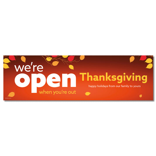 A banner with a red background featuring text that reads 'we're open Thanksgiving' surrounded by fall leaves in shades of orange and yellow.