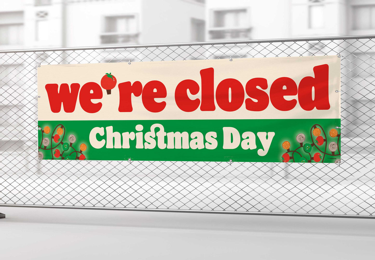 Closed Christmas Day sign on a chain-link fence
